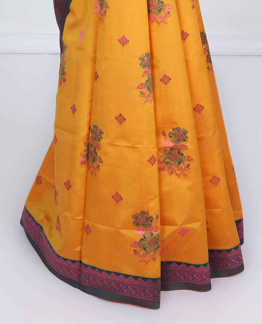 Orange butter silk saree with floral buttas, contrast rose copper zari design border & intricate palluOrange butter silk saree with floral buttas, contrast rose copper zari design border & intricate pallu