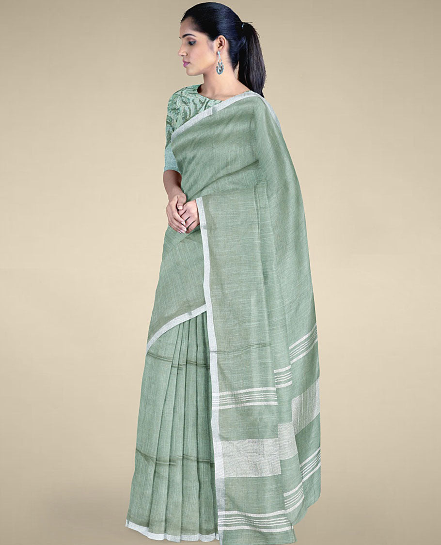 Green plain design cotton saree with plain border & pallu of stripes, floral vine printed blouse