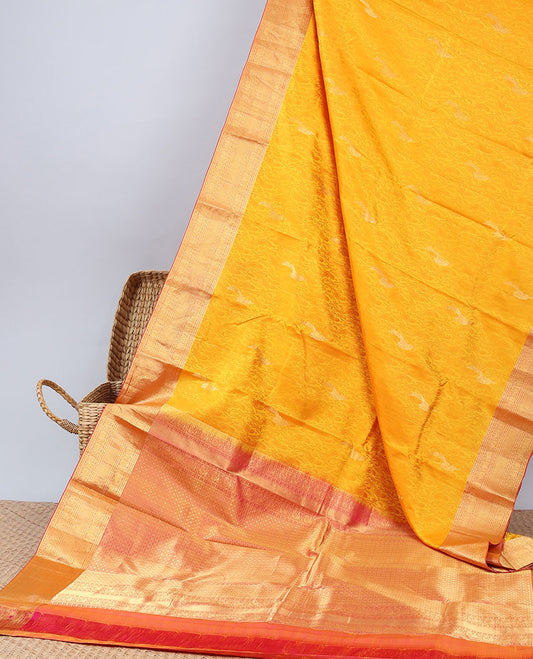 Yellow embossed Bangalore silksaree with buttas, contrast traditional motifs zari border & pallu of intricate designs