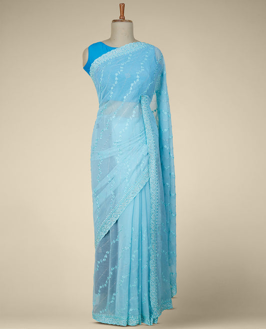 Blue floral vine thread embroidered & stonework designer chiffon saree, scallop stone embroidery border & 