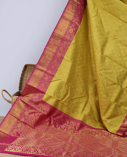 Green jacquard silksaree,contrast border of thilakam mokku,banaras,rudraksham,kodi visiry & vanki & pallu of jaal design