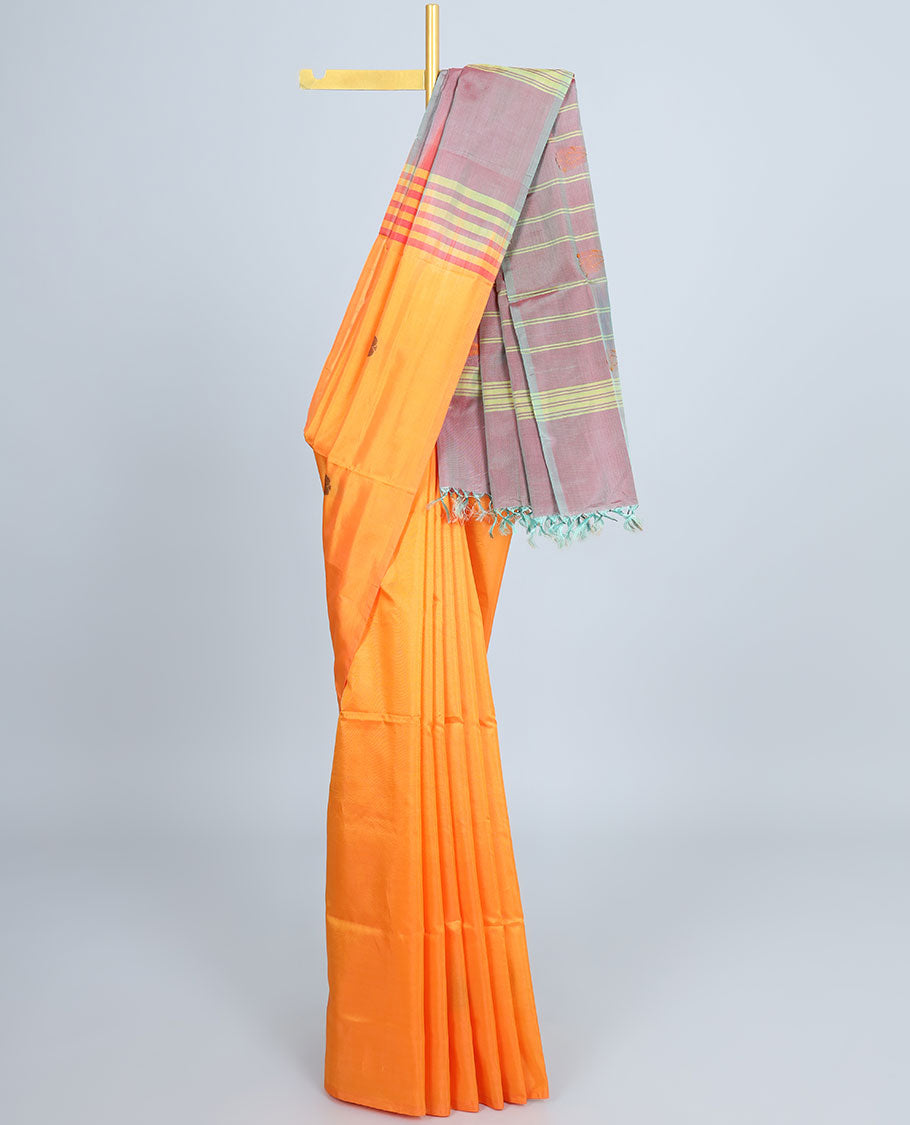 Borderless orange banana pith saree with all-over buttas, contrast pallu of stripes