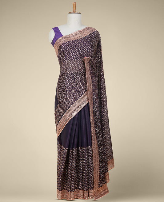 Purple sequins & thread embroidered georgette saree, intricately embroidered border