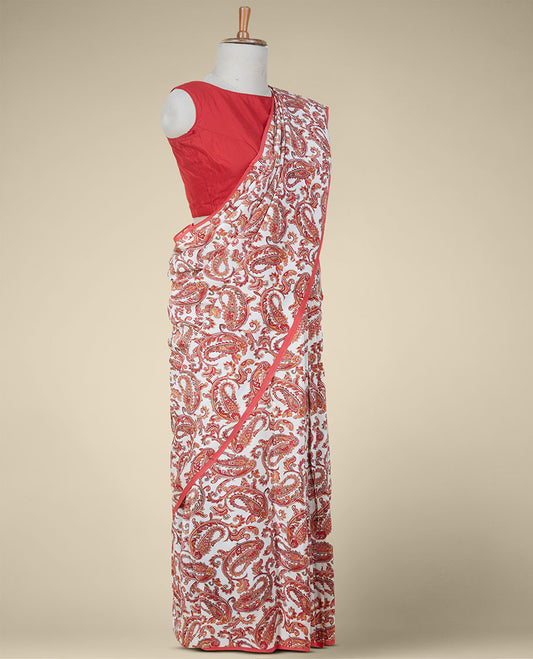 Borderless cream intricate paisley motifs printed fancy crepe saree