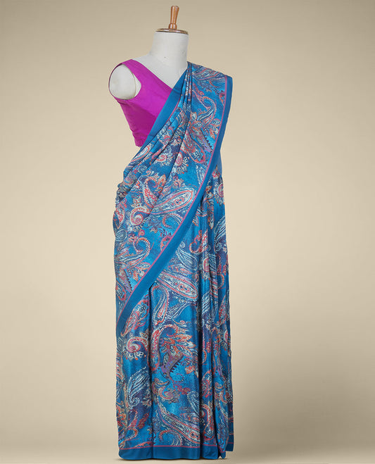 Blue intricate paisley designs printed fancy crepe saree, plain border