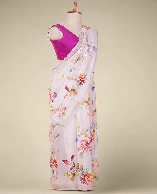 Purple printed semi banaras crepe saree features multi-color floral motifs 
