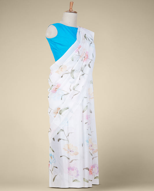 White printed semi banaras crepe saree accentuated with multi-color floral motifs 