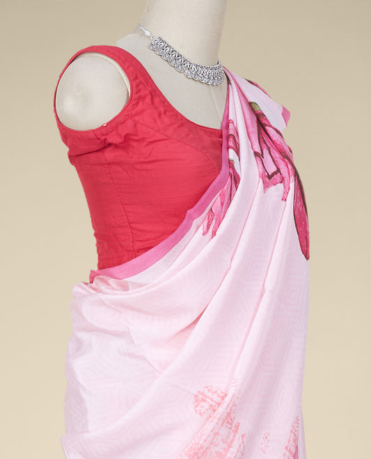 Pastel pink base pure crepe saree features an abstract-style floral print