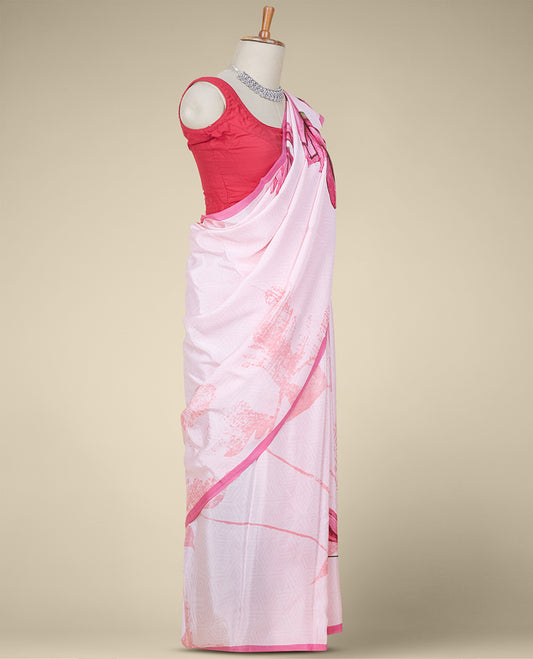 Pastel pink base pure crepe saree features an abstract-style floral print