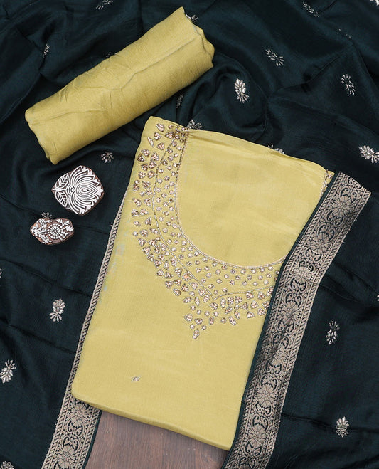 Green material chudidhar set, stone & sequins embroidered tissue top, santoon plain bottom & dupatta of buttas 