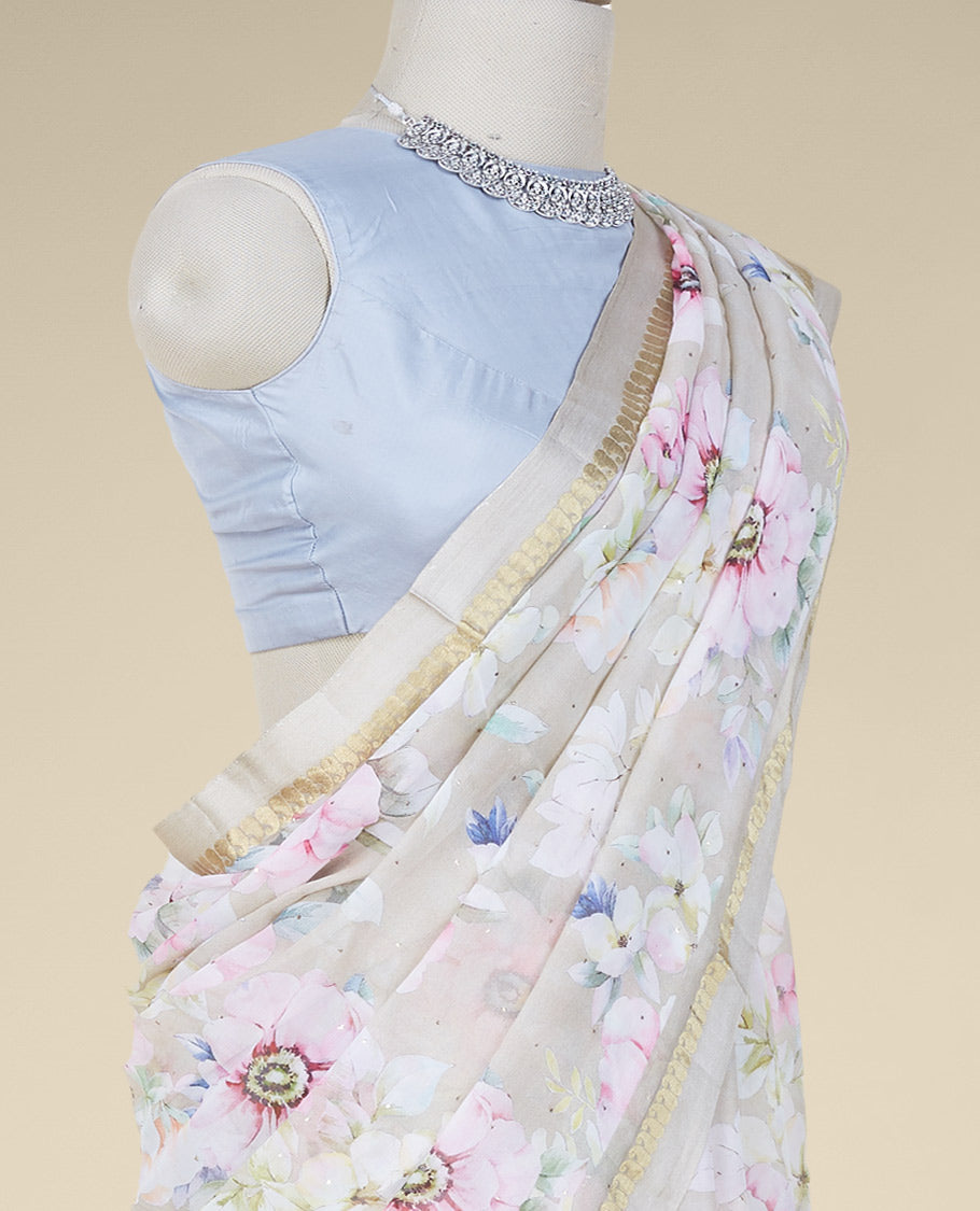 Multi-color floral designs digital printed with stone work pure chiffon saree, contrast border of zari paisleys