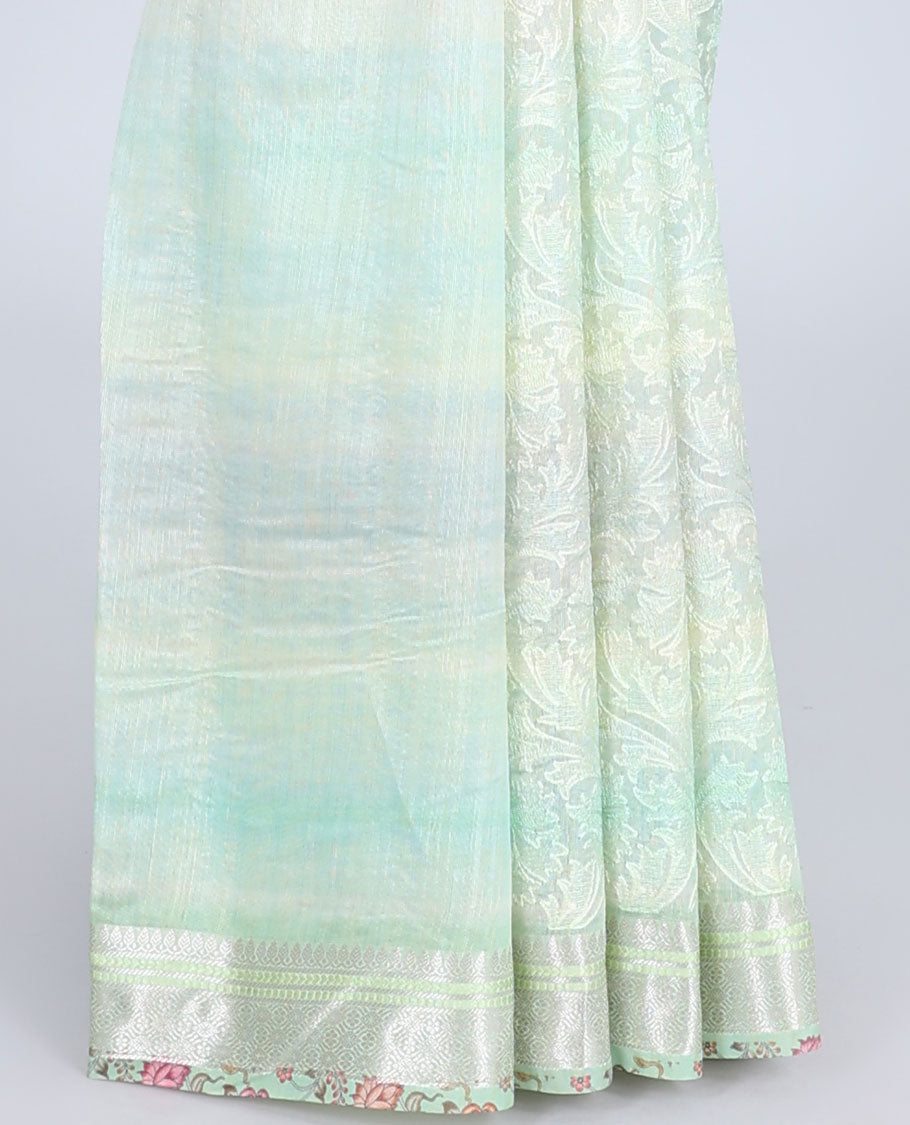 Green shaded intricately embroidered semi-linen saree, zari border & floral vine printed pallu with zari stripes