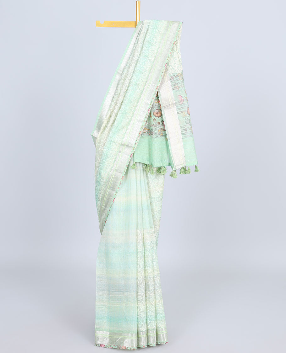Green shaded intricately embroidered semi-linen saree, zari border & floral vine printed pallu with zari stripes