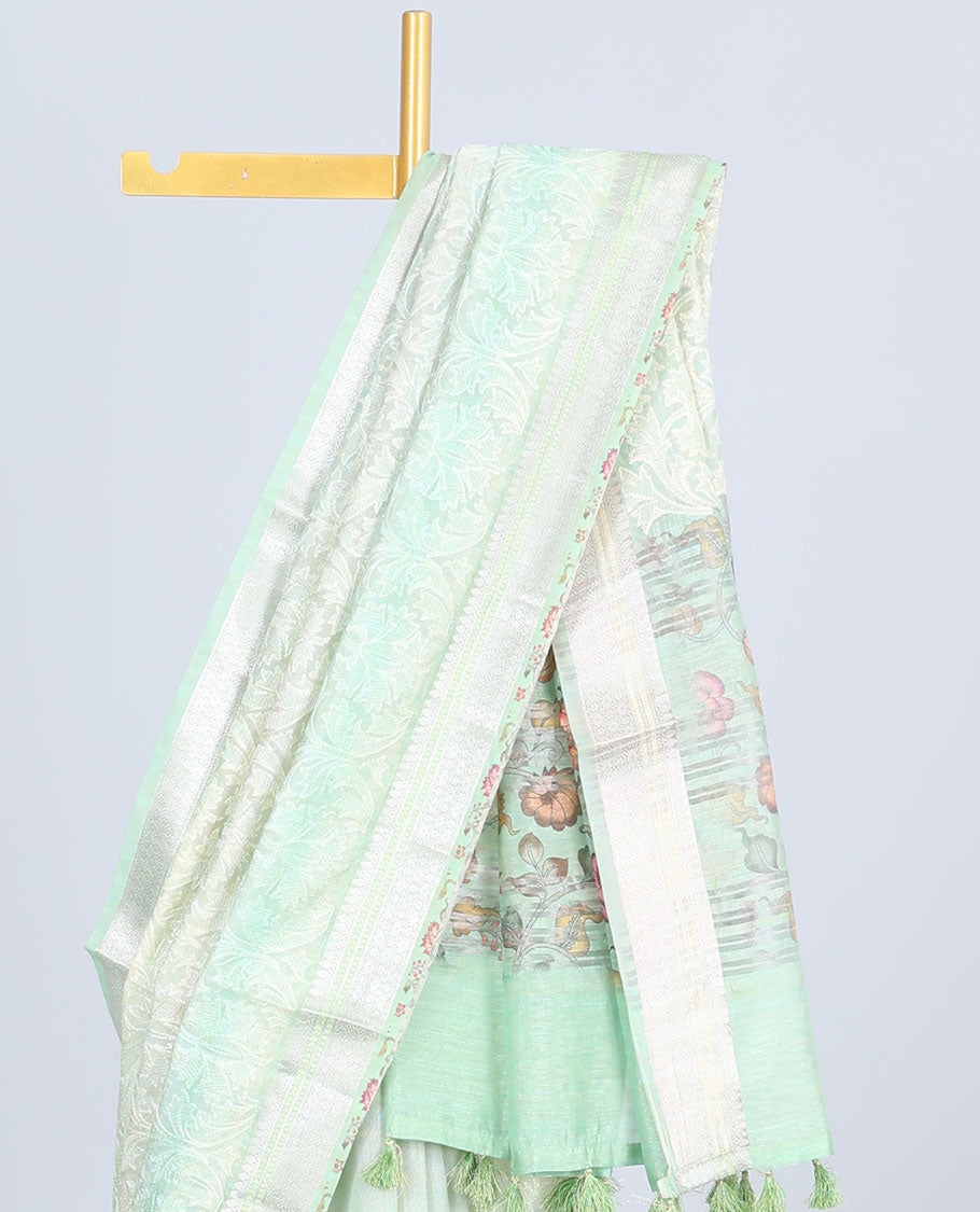 Green shaded intricately embroidered semi-linen saree, zari border & floral vine printed pallu with zari stripes