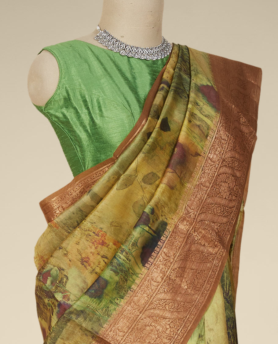 Yellow floral & abstract-style printed organza saree with contrast border of traditional designs