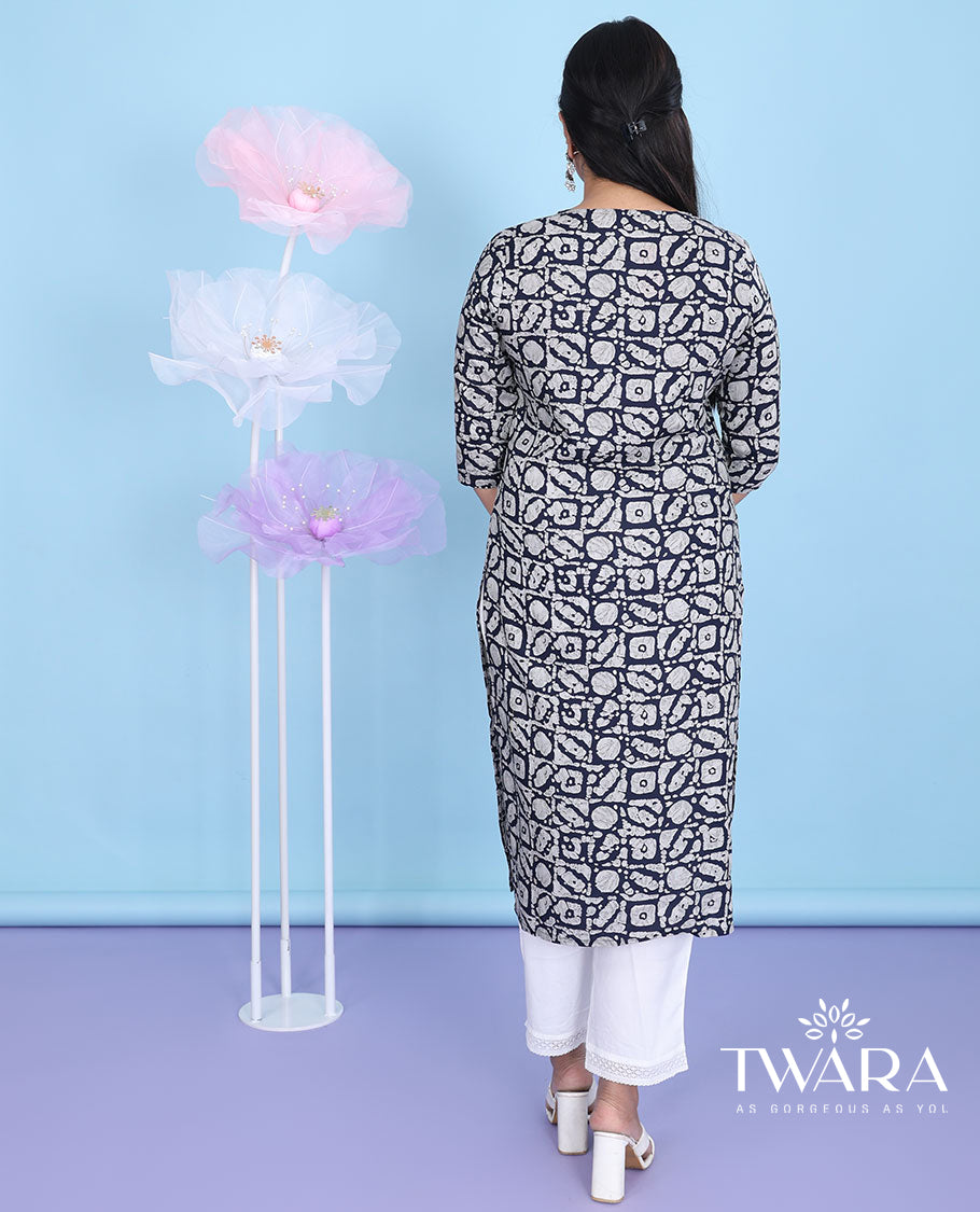 Black batik-style intricately printed round neck with 3/4th sleeve cotton straight-cut below-knee kurti