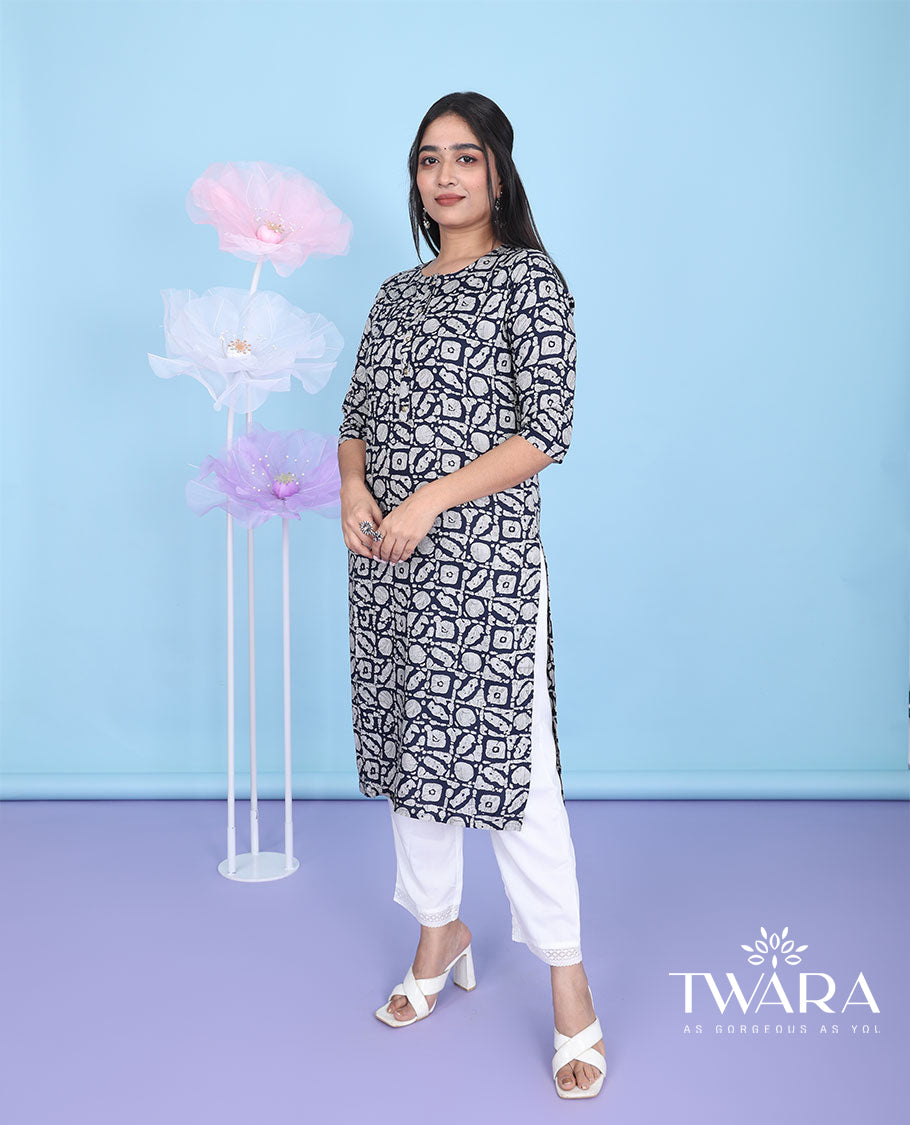Black batik-style intricately printed round neck with 3/4th sleeve cotton straight-cut below-knee kurti