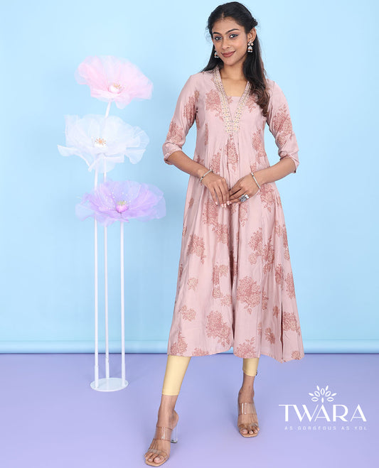 Pink intricate floral design V-neck with 3/4th sleeve A-line muslin below-knee kurti
