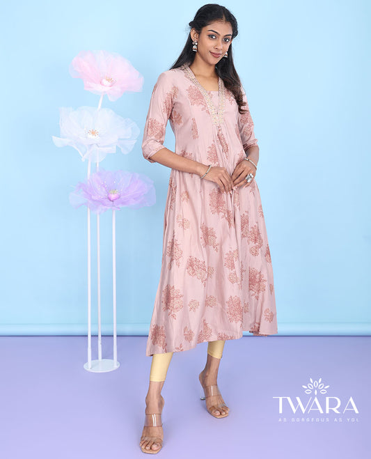 Pink intricate floral design V-neck with 3/4th sleeve A-line muslin below-knee kurti
