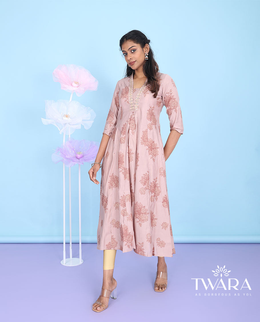 Pink intricate floral design V-neck with 3/4th sleeve A-line muslin below-knee kurti