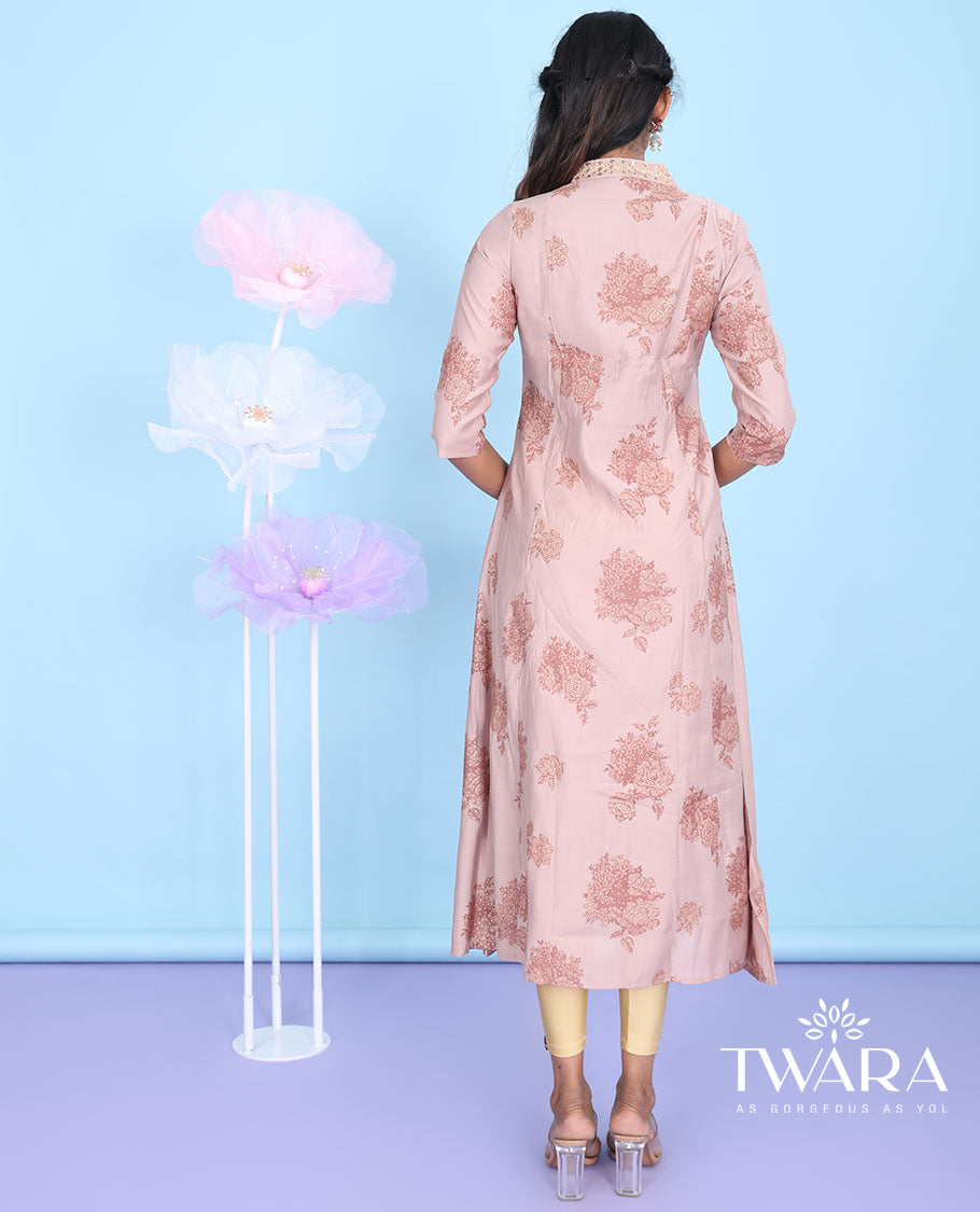 Pink intricate floral design V-neck with 3/4th sleeve A-line muslin below-knee kurti