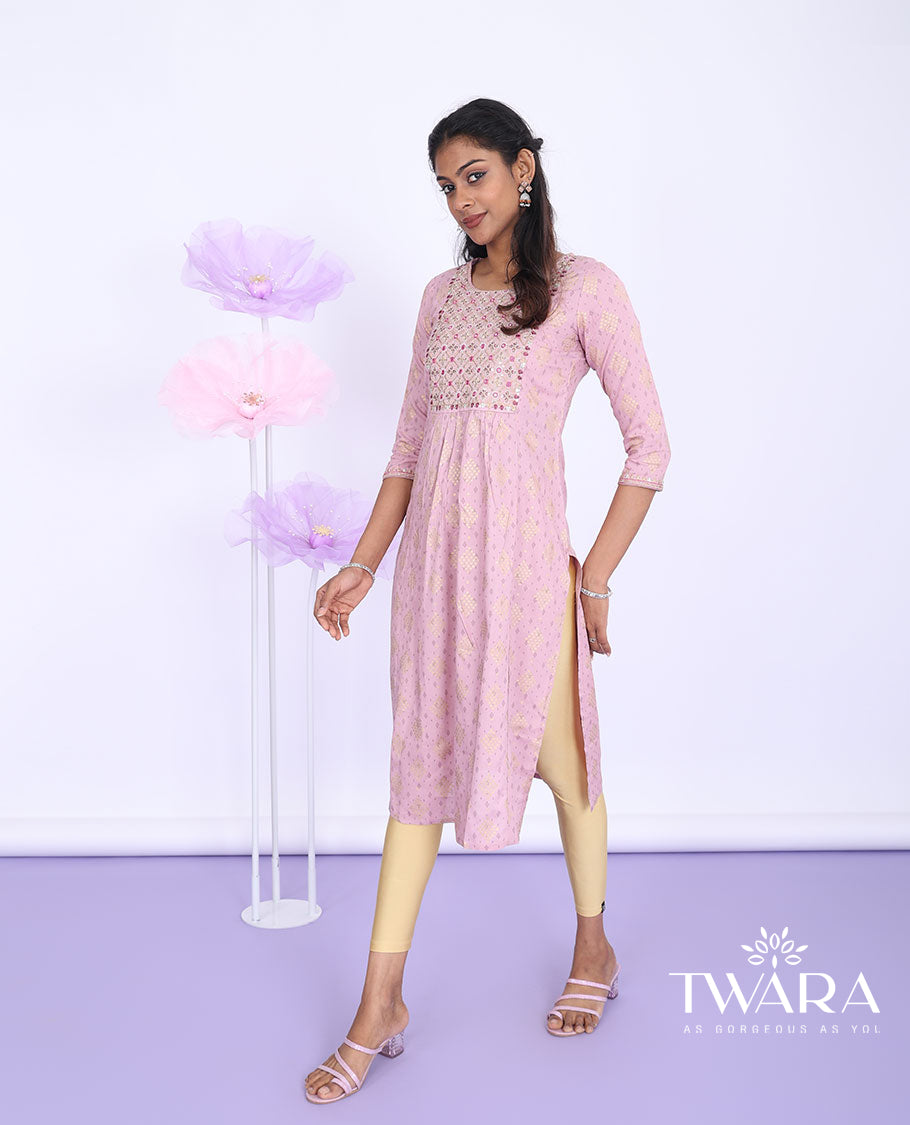 Pink intricate print, glitter work & mirror embroidered round neck with 3/4th sleeve cotton nyra-cut knee-length kurti