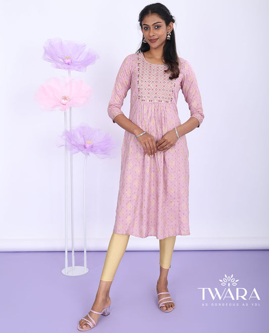 Pink intricate print, glitter work & mirror embroidered round neck with 3/4th sleeve cotton nyra-cut knee-length kurti