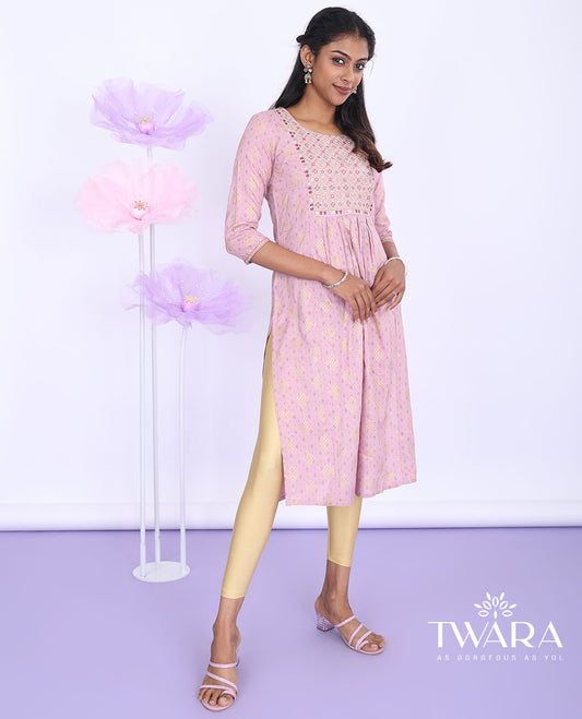 Pink intricate print, glitter work & mirror embroidered round neck with 3/4th sleeve cotton nyra-cut knee-length kurti
