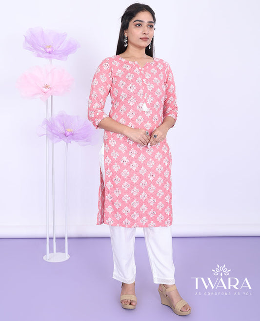 Twara pink intricately printed round neck with 3/4th sleeve rayon straight-cut below-knee kurti