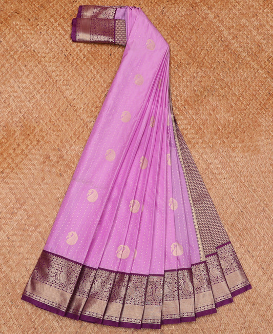 Pink Budget Silk Saree Artfully Detailed with Small Buttas and Paisley Buttas, Complemented by a Contrast Traditional Zari Motif Border, Adorned with Pallu of Intricate Designs, and Paired with a Contrast Blouse