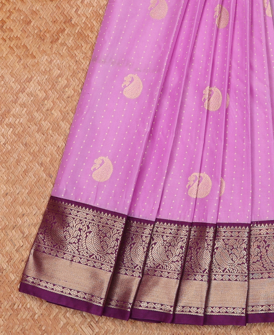 Pink Budget Silk Saree Artfully Detailed with Small Buttas and Paisley Buttas, Complemented by a Contrast Traditional Zari Motif Border, Adorned with Pallu of Intricate Designs, and Paired with a Contrast Blouse