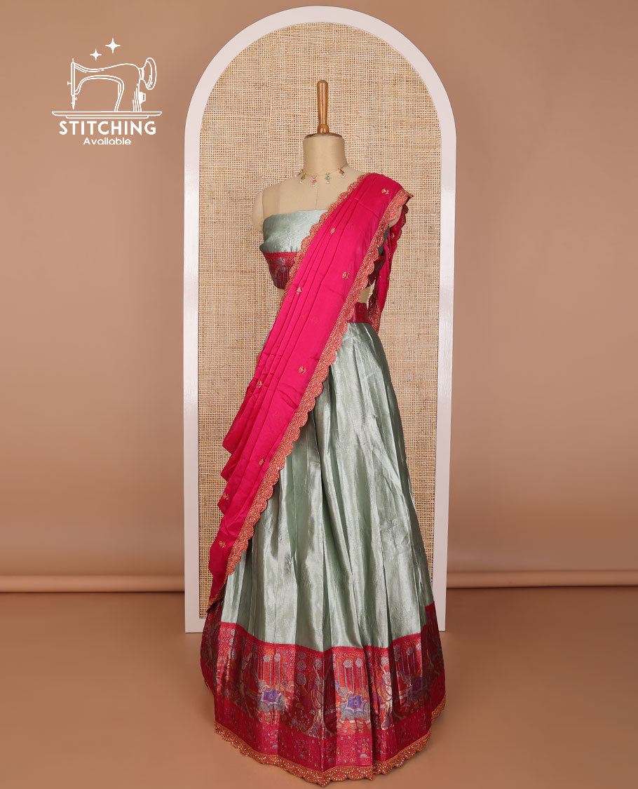 Grey tissue half saree with contrast floral, elephant design border, floral design blouse & floral embroidery, scallop border dhavani