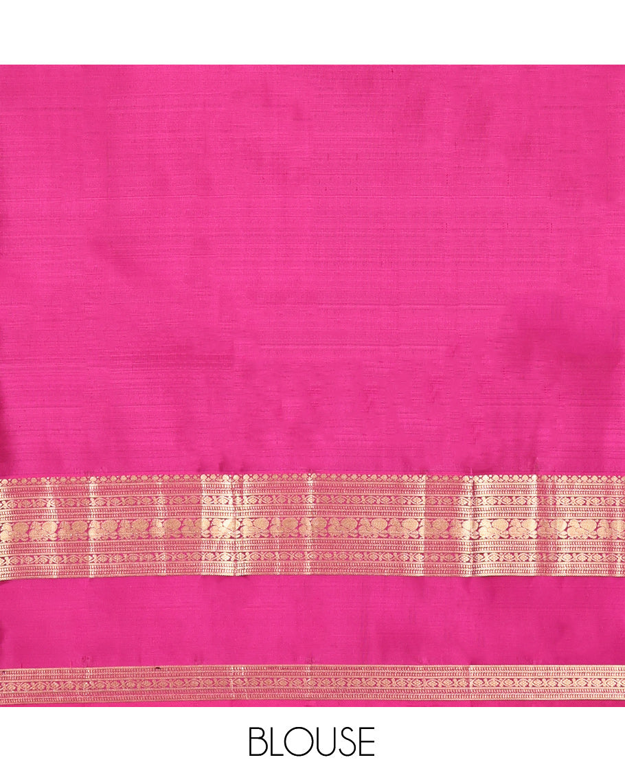 Maroon Vasundhara Silk Saree, Spotlighted with Chakram Buttas, a Rettai Pettu Border of Muthu, Kodi Visiry, and Mayil Designs, Contrast Grand Pallu, and a Contrast Blouse