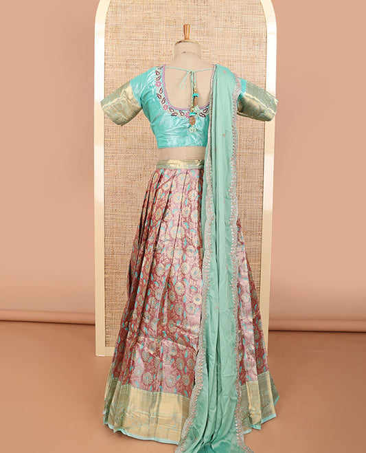 Brown floral jacquard half saree with contrast zari design border, floral embroidered blouse & floral embroidery dhavani