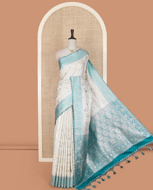 Pearl White Art Vastrakala Silk Saree Enthralled with Floral Jaal Jacquard with Stone Work All Over Its Body, Complemented by a Contrast Floral Creeper Zari Stone Work Border, Pallu Detailed in Zari and Stone Work, and Paired with a Contrast Blouse