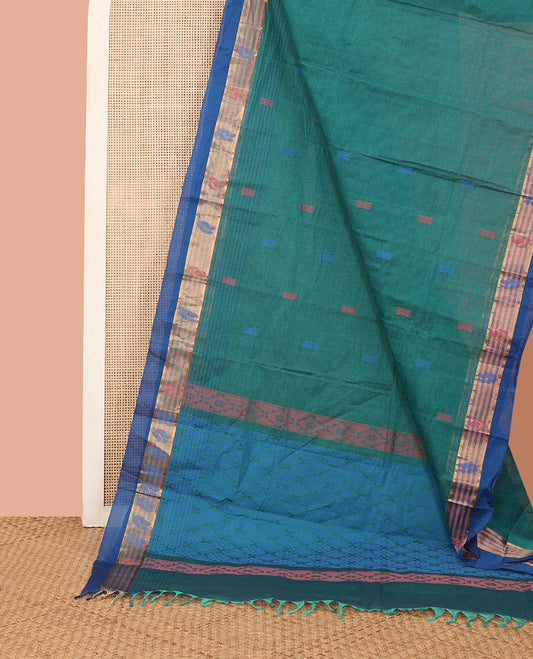 Blue Kanchi Cotton Saree, Showcasing Thread Buttas All Over Its Body, Complemented by a Contrast Border, Pallu of Jaal Designs, and Paired with a Matching Blouse