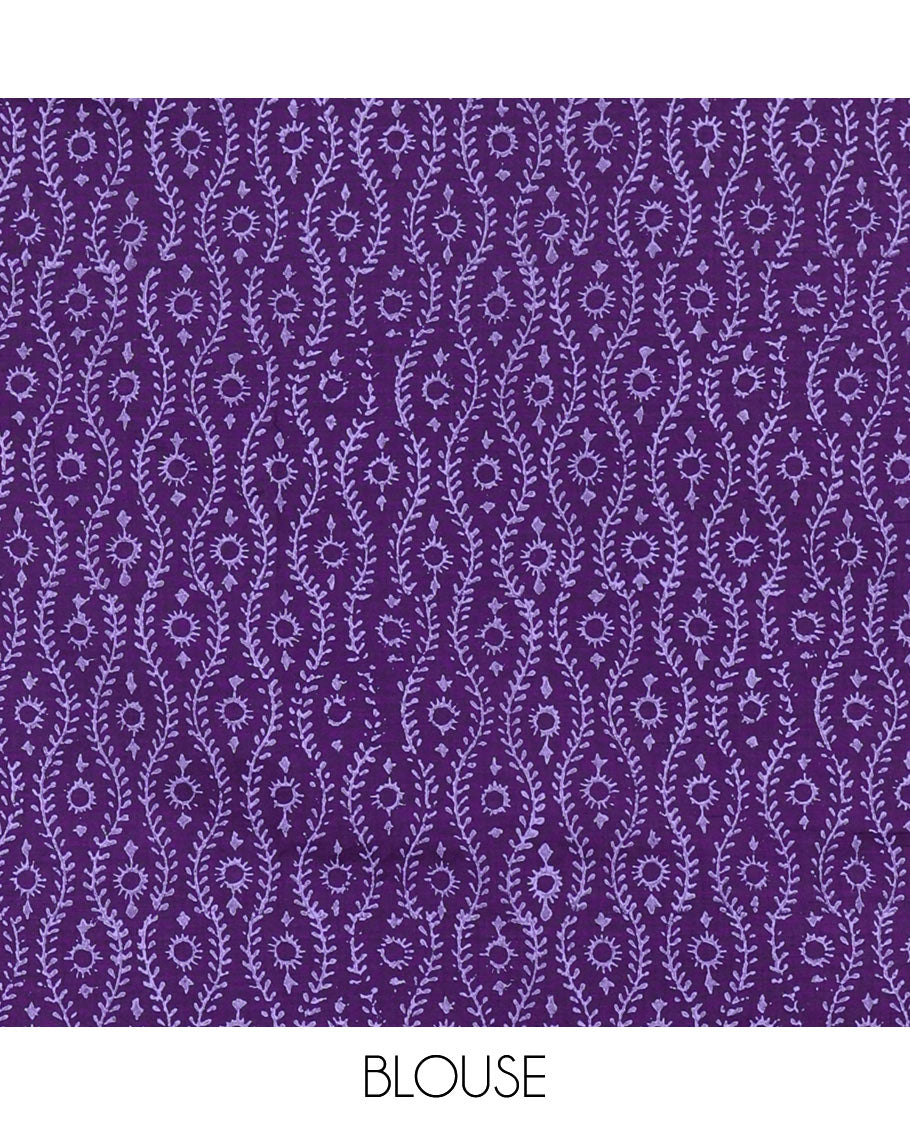 Borderless light lavender thilakam motifs patch embroidered South cotton saree with a plain blouse and a contrast ogee patterns printed blouse