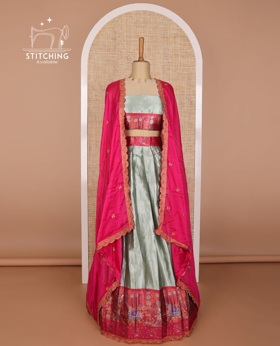 Grey tissue half saree with contrast floral, elephant design border, floral design blouse & floral embroidery, scallop border dhavani