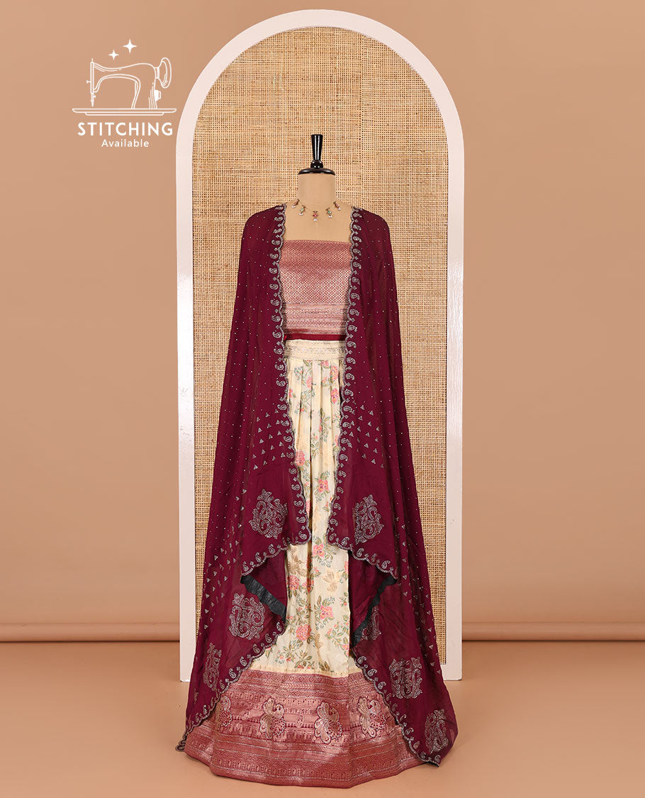 Cream and wine half-saree, floral and bird printed nylon viscose crepe top, contrast traditional zari and stone work border, jacquard banaras blouse, and scallop stone work dhavani