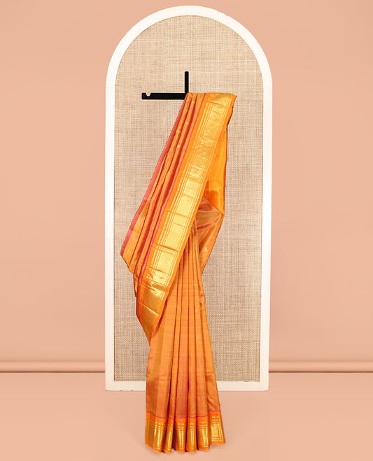 Orange Kanchipuram Silk Saree, Woven with Zari Buttas, Highlighted by a Zari One-Sided Border of Panner Sombu, Banaras, Muthu, and Jaal Design, Zari Design Pallu, and No Blouse