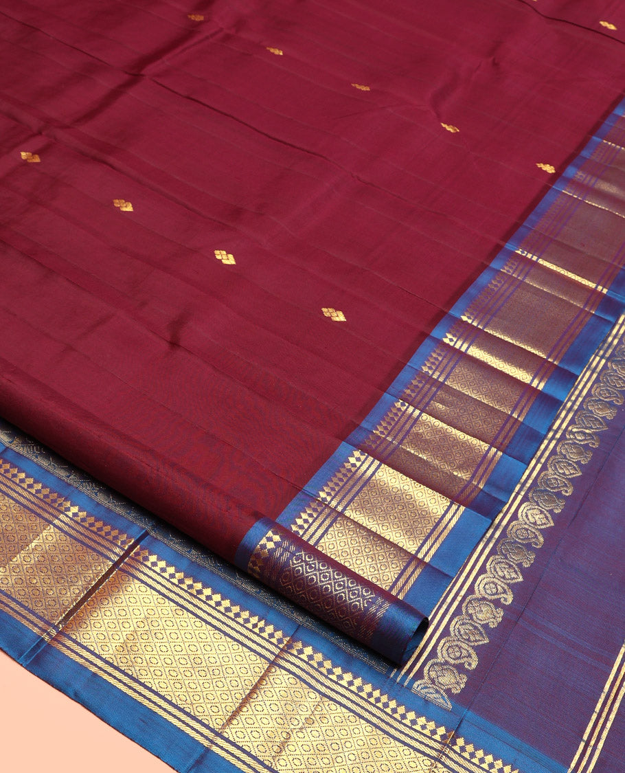 Maroon Kanchipuram Silk Saree, Decorated with Zari Buttas, Contrast Border of Paneer Sombu, Banaras, and Jaal, Pallu of Floral Creeper Design, and No Blouse