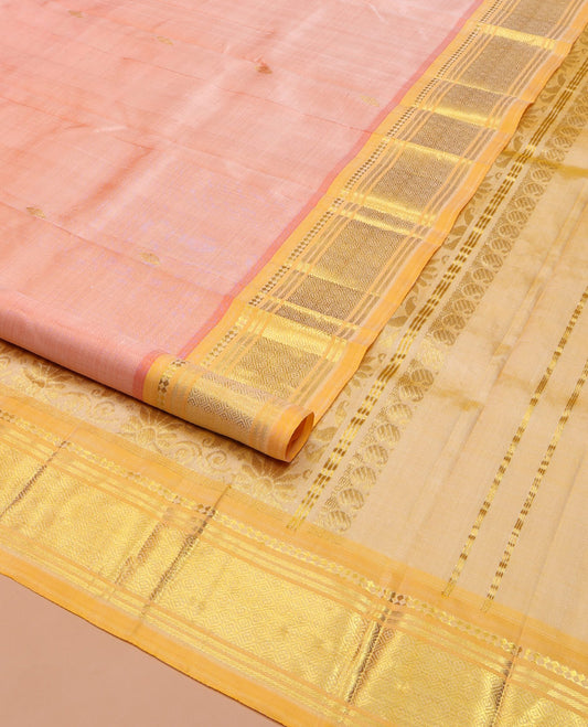Pink Kanchipuram Silk Saree, Gleamed Up with Zari Buttas on Its Body, Complemented by a Contrast One-Sided Border of Panner Sombu, Banaras, and Jaal Designs, Pallu Features Floral Designs, and Comes Without a Blouse