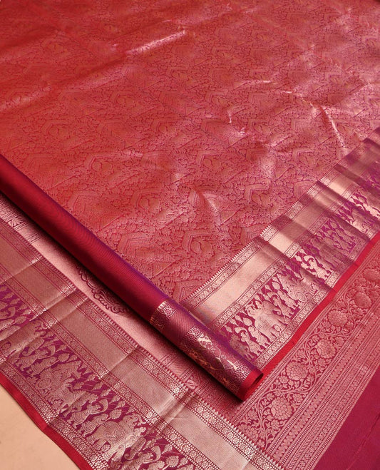 Red Kanchipuram Wedding Silk Saree, Majestically Detailed with Jacquard Design on Its Body, Highlighted by Zari Border of Rekku, Muthu, Kamalam, and Wedding-Themed Designs, Grand Pallu, and Paired with a Matching Blouse