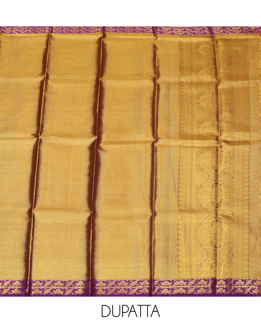 Green Pure Silk Half-Saree, Artfully Detailed with Floral Jacquard All Over Its Skirt, Complemented by a Contrast Border of Yaanai, Mayil, and Kodi Visiry Designs, Paired with a Contrast Blouse, and Comes with an Intricately Designed Dhavani