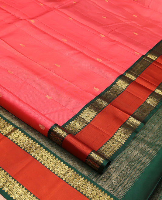 Pink Vasundhara Silk Saree, Subtly Woven with Stripes and Buttas All Over Its Body Complemented by Contrast Rettai Pettu Border of Thilakam, Banaras, Muthu, and Laddu Kamalam Designs, Grand Jaal Pallu and Paired with a Contrast Blouse