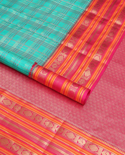 Green checked vasundhara elite silk saree with contrast traditional zari design border & intricate jaal design pallu