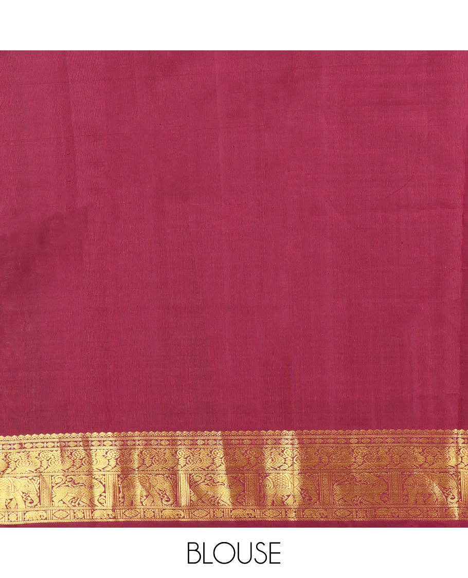 Red Kanchipuram Silk Saree, Lightly Embellished with Kuthirai and Chakram Buttas All Over Its Body, Highlighted by Zari Border of Salngai, Poun, Mayil, Yaali, and Yaanai Designs, Pallu of Ara Maadam Design, and Paired with a Matching Blouse