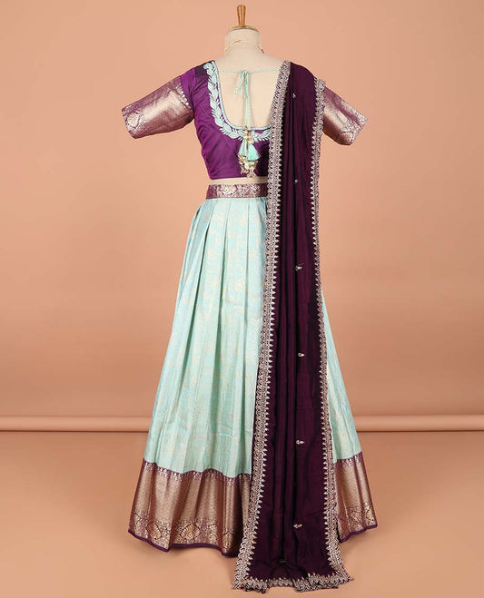 Blue floral jacquard semi-stitched half saree with contrast zari border,  embroidered blouse & scallop border dhavani