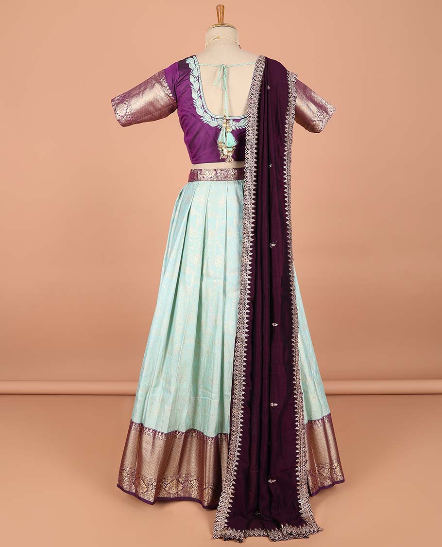 Blue floral jacquard semi-stitched half saree with contrast zari border,  embroidered blouse & scallop border dhavani