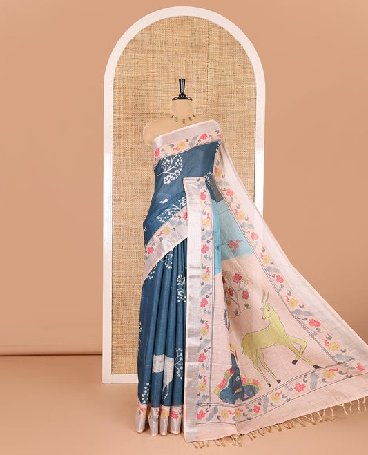 Blue floral and deer motifs printed Linen cotton saree, contrast zari border of floral creeper print, flora-fauna printed pallu, and floral motifs printed blouse
